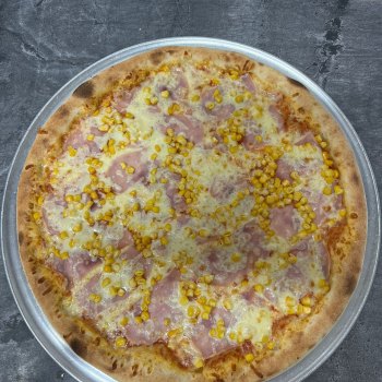 4. Americana - rajčatová omáčka, mozzarella, šunka, kukuřice (1, 7) - foto č. 4